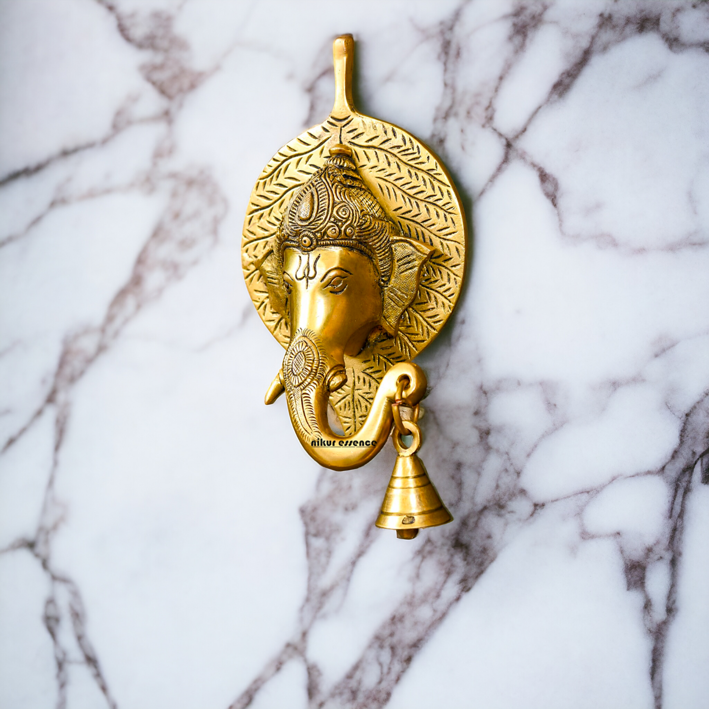 Ganesha on leaf with Bells brass wall hanging idol - 7.5 Inches Nikuressence