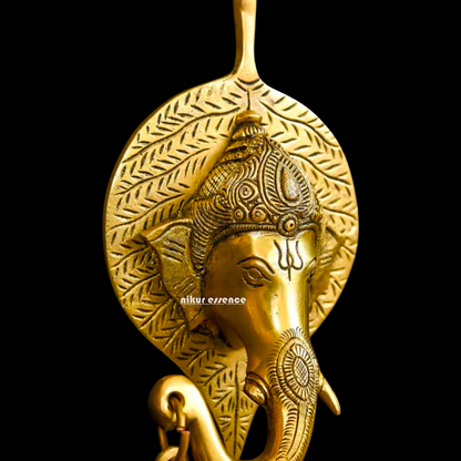 Ganesha on leaf with Bells brass wall hanging idol - 7.5 Inches Nikuressence