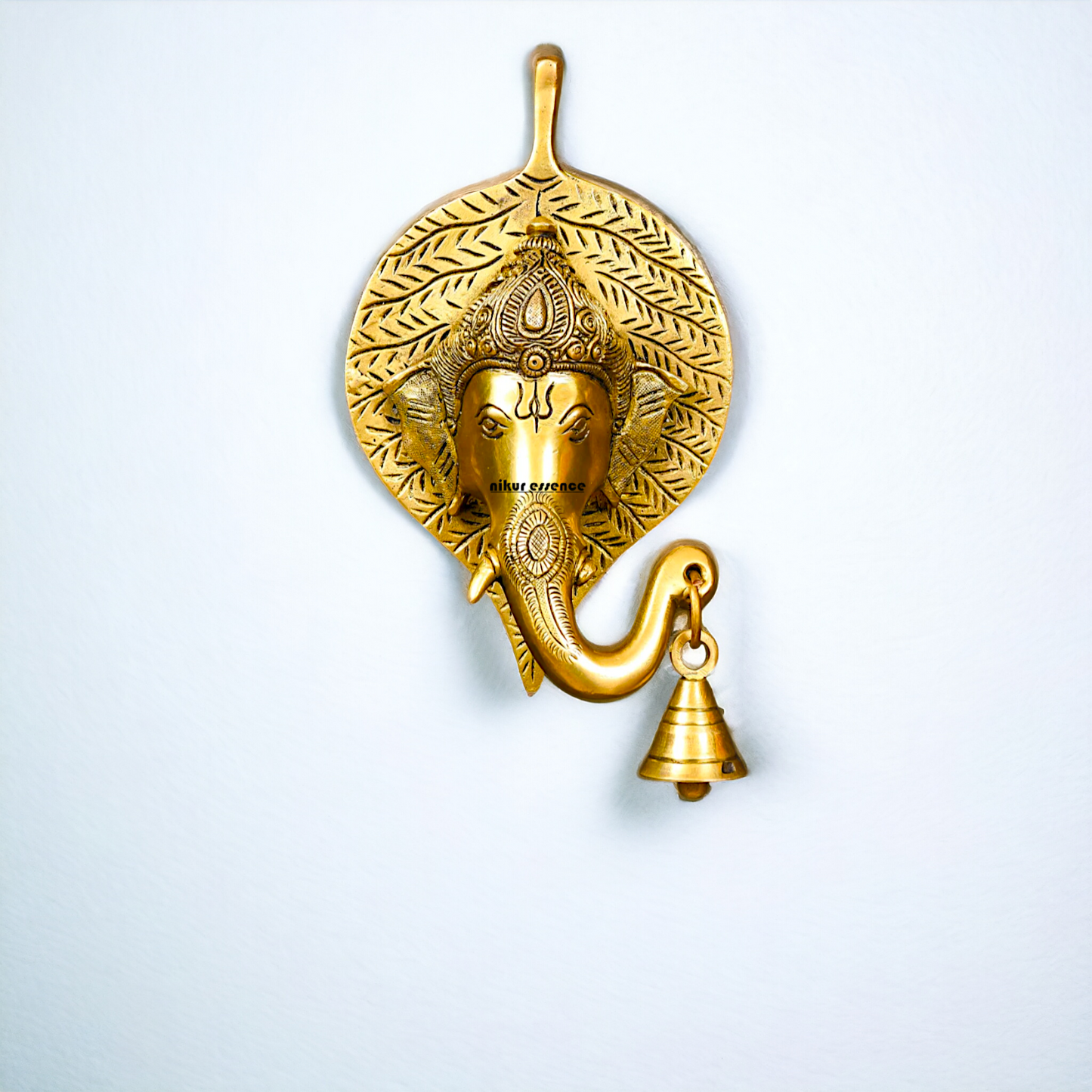 Ganesha Ganpati on leaf with Bell Brass wall hanging plate idol - 8 Inches Nikuressence