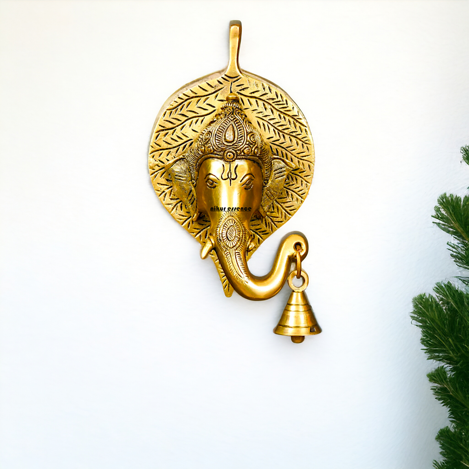 Ganesha Ganpati on leaf with Bell Brass wall hanging plate idol - 8 Inches Nikuressence