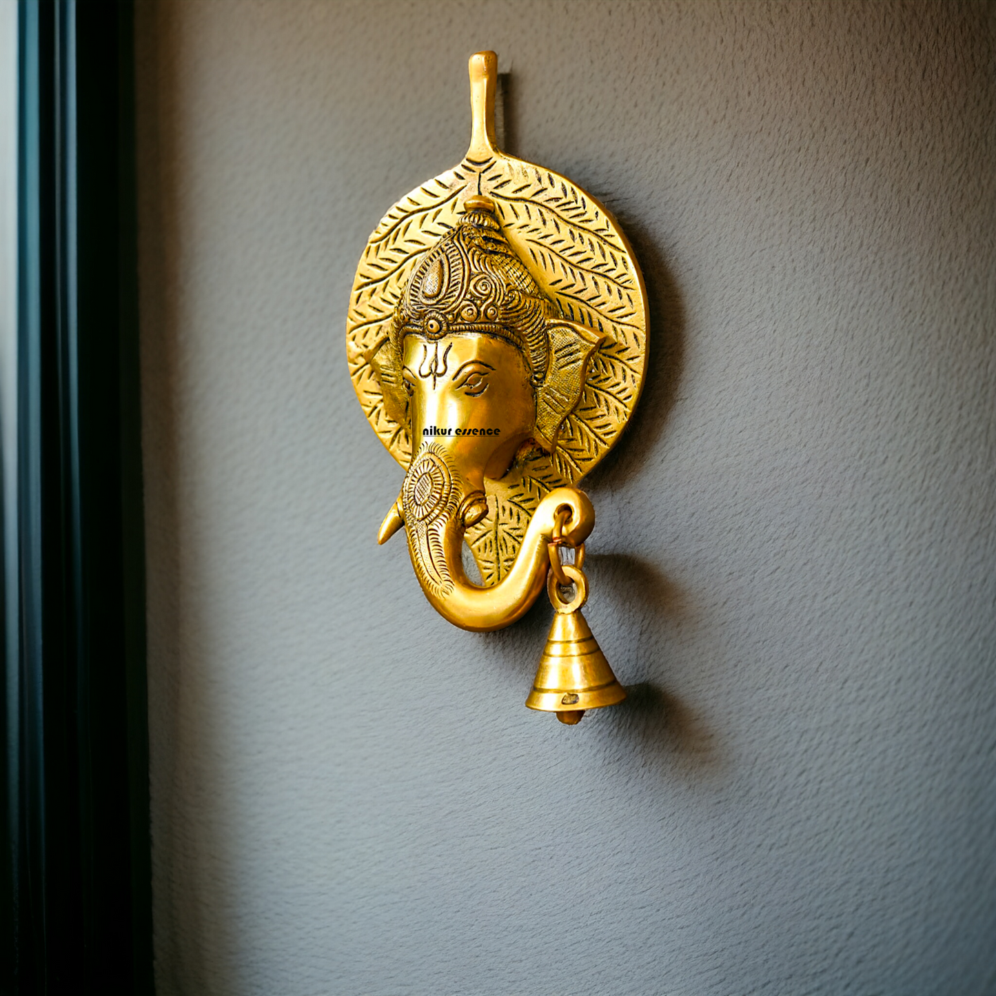 Ganesha Ganpati on leaf with Bell Brass wall hanging plate idol - 8 Inches Nikuressence