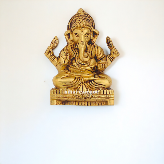 Brass Ganesha seated wall hanging plate idol- 7 inches Nikuressence