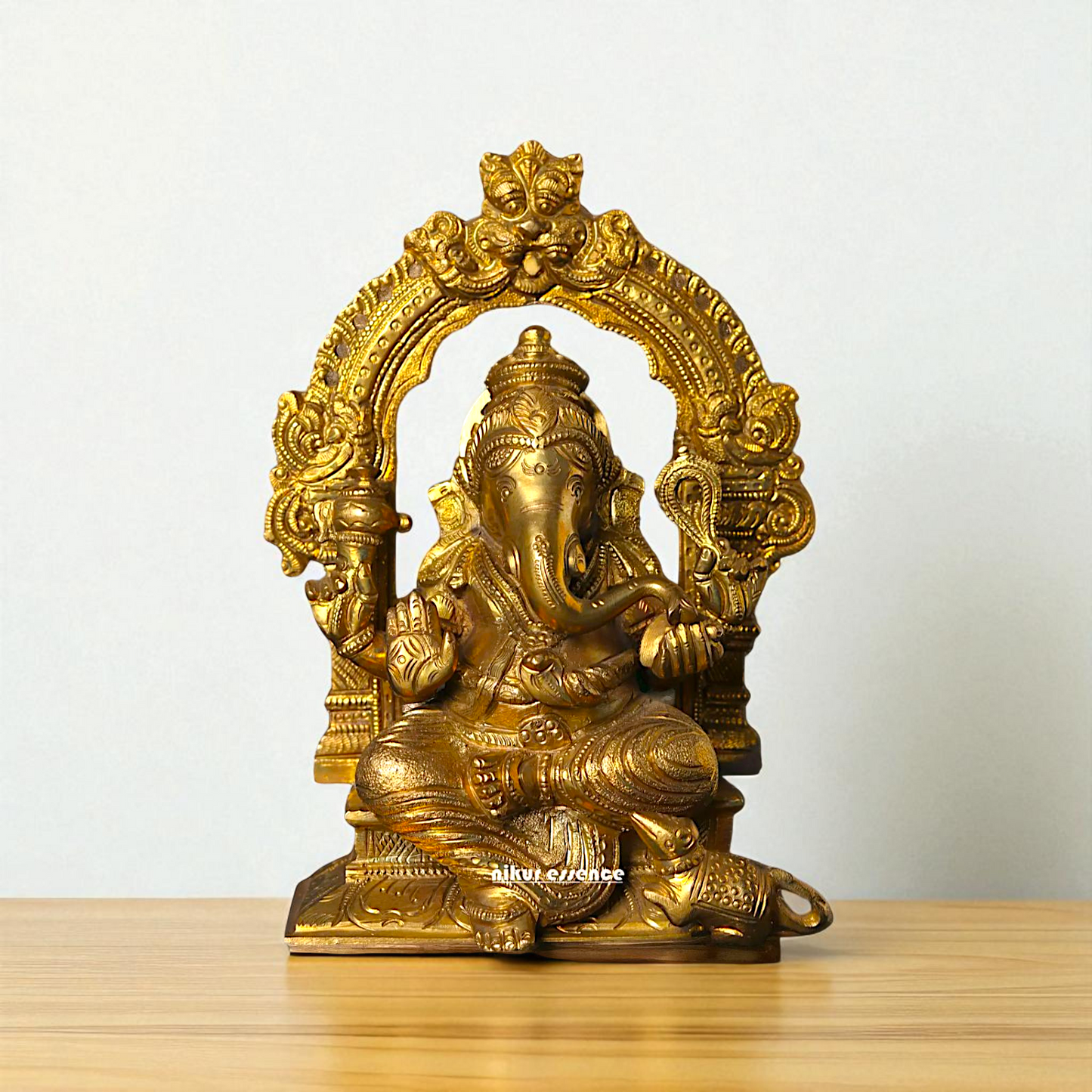 Ganesha seated on singhasan Panchaloha idol - 7 Inches Nikuressence