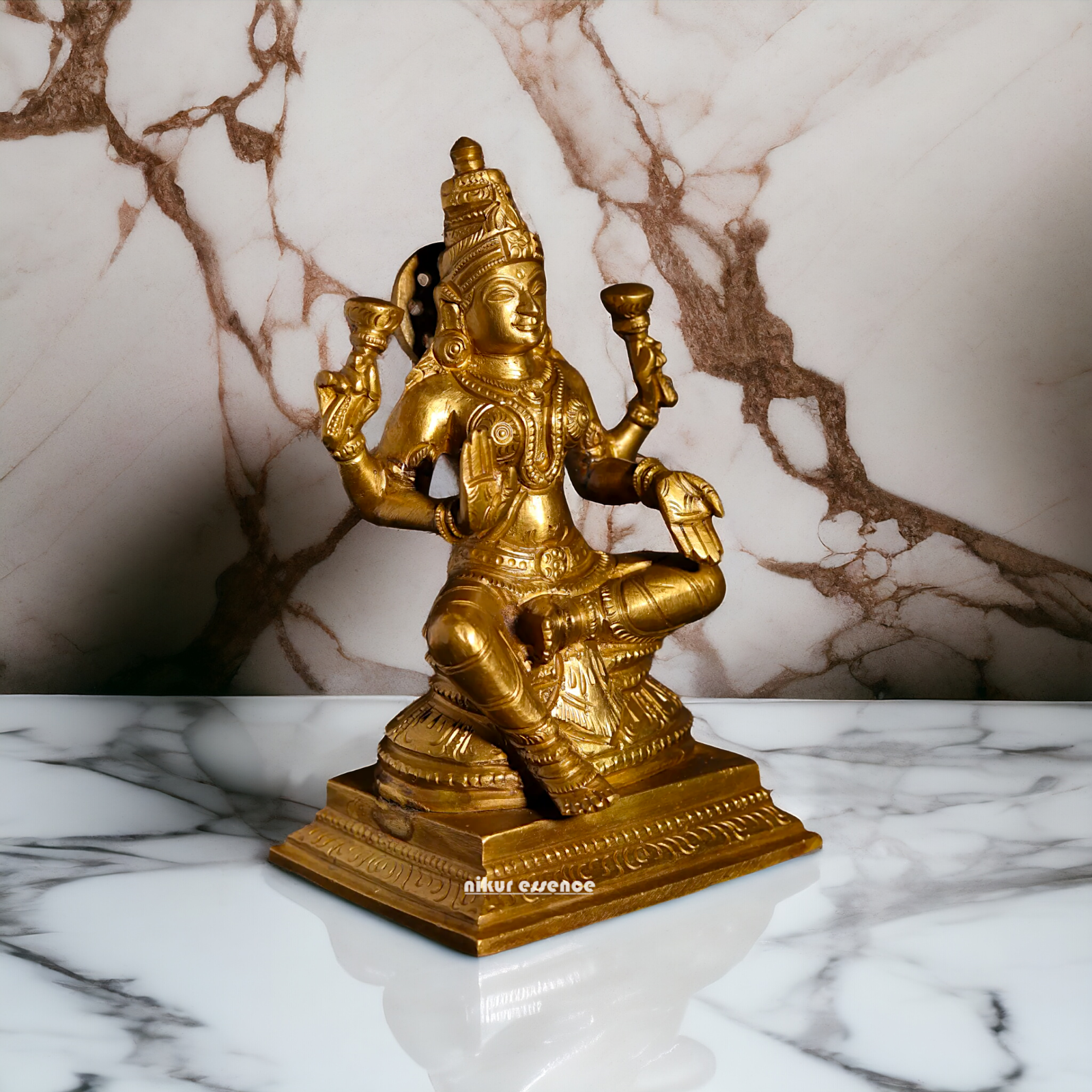 Goddess Lakshmi Sitting with Four Arm Panchaloha idol - 5 Inches Nikuressence