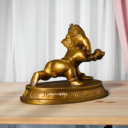 Bal Ganesh Ganpati with Laddoo Bronze/Panchaloha idol - 5 Inches Nikuressence