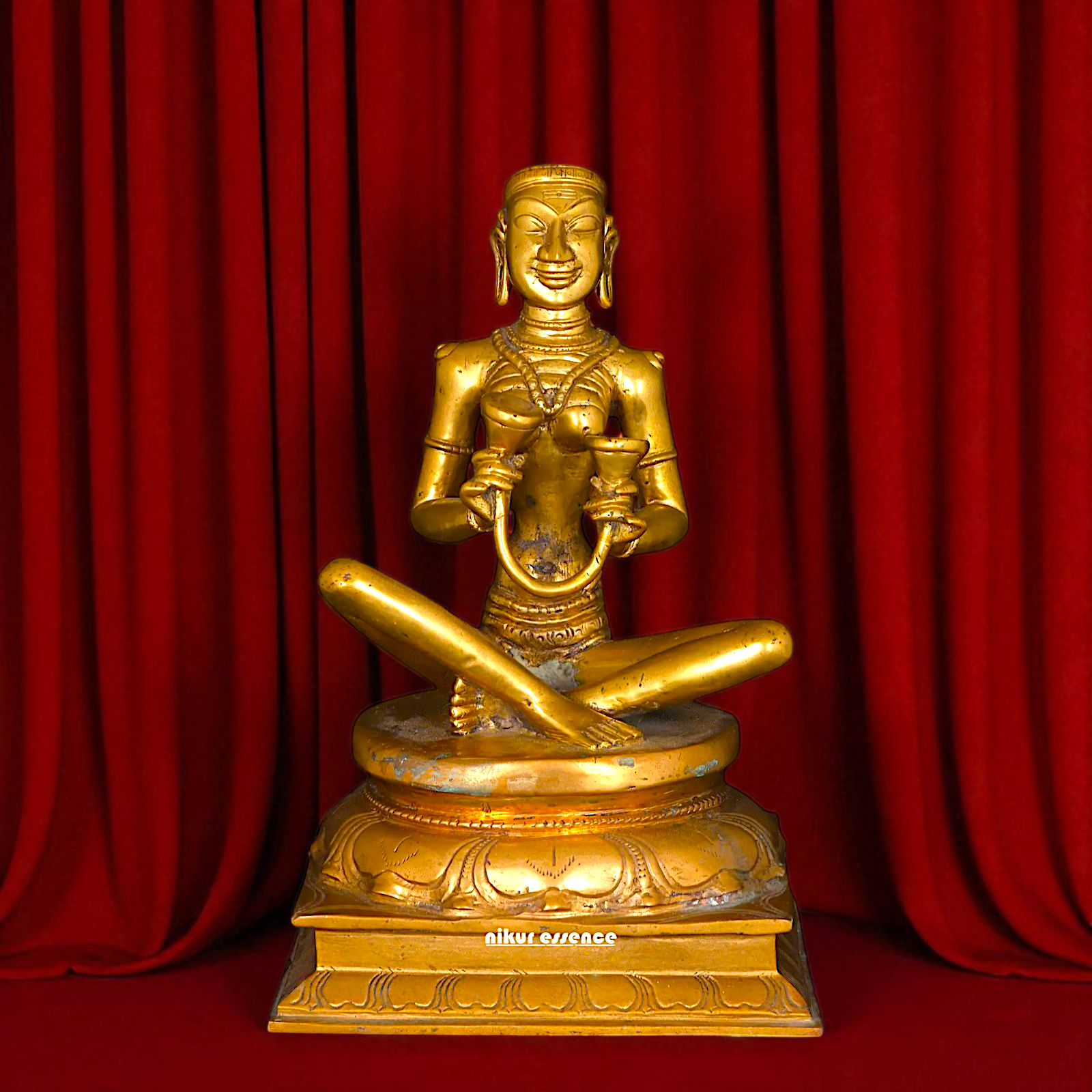 Karaikal Ammaiyar seated Panchaloha idol - 10 inches Nikuressence