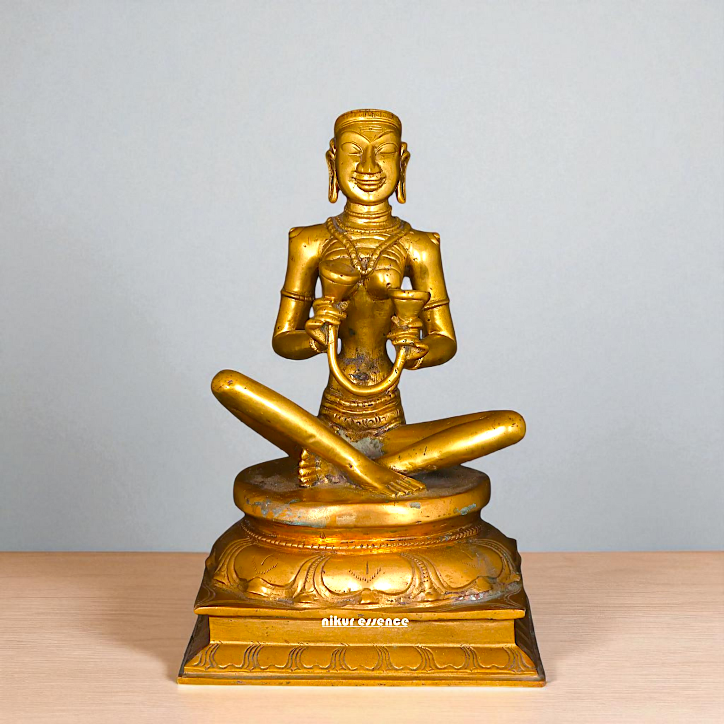 Karaikal Ammaiyar seated Panchaloha idol - 10 inches Nikuressence