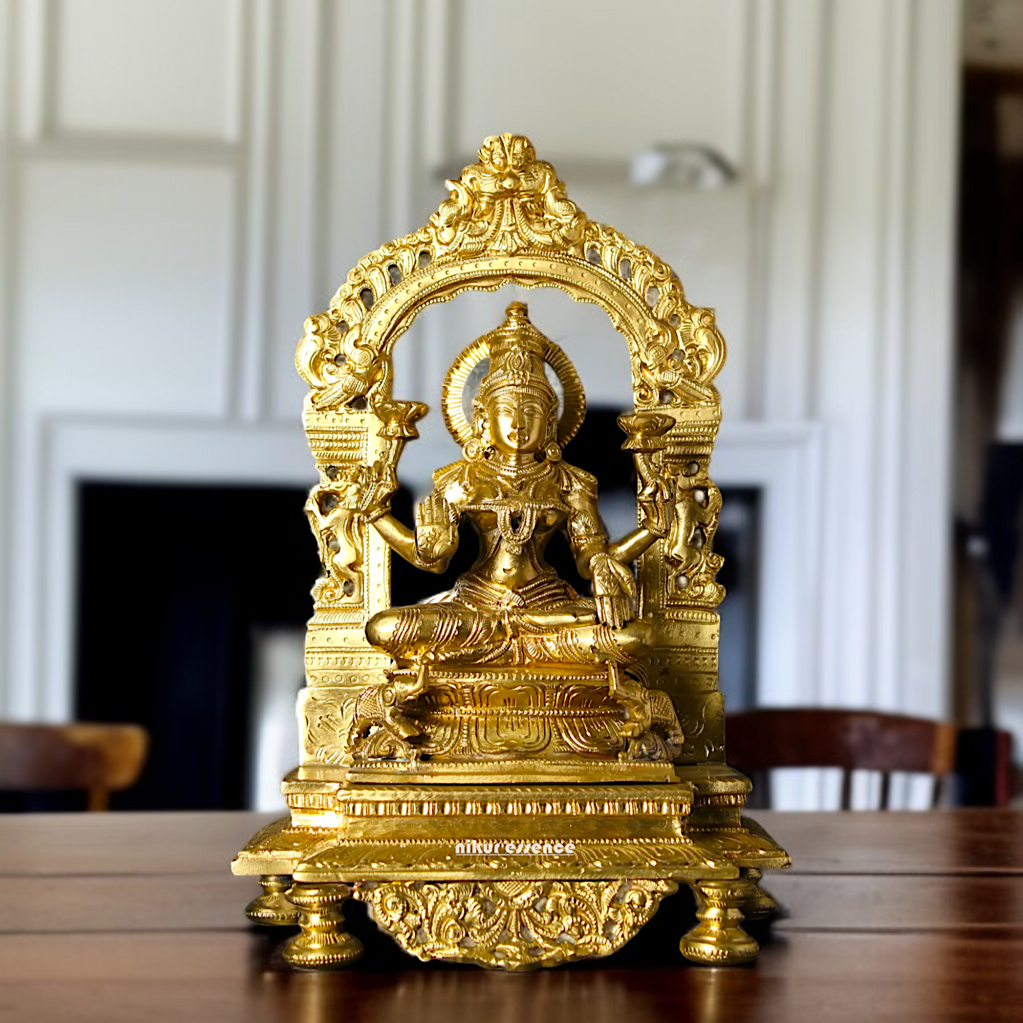 Goddess Lakshmi Devi with Four hand seated Panchaloha idol - 13 inches Nikuressence