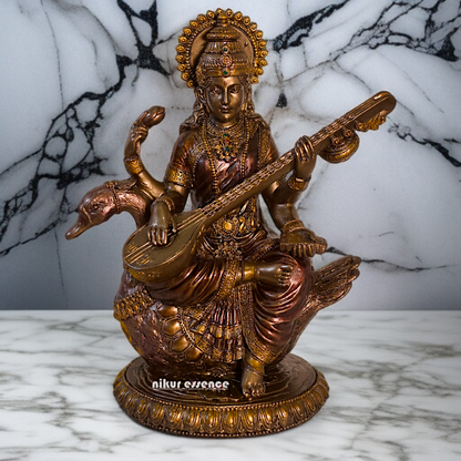 Large Saraswati seated on swan with Playing Veena Bronze Idol - 8.26 Inches Nikuressence