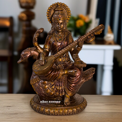 Large Saraswati seated on swan with Playing Veena Bronze Idol - 8.26 Inches Nikuressence
