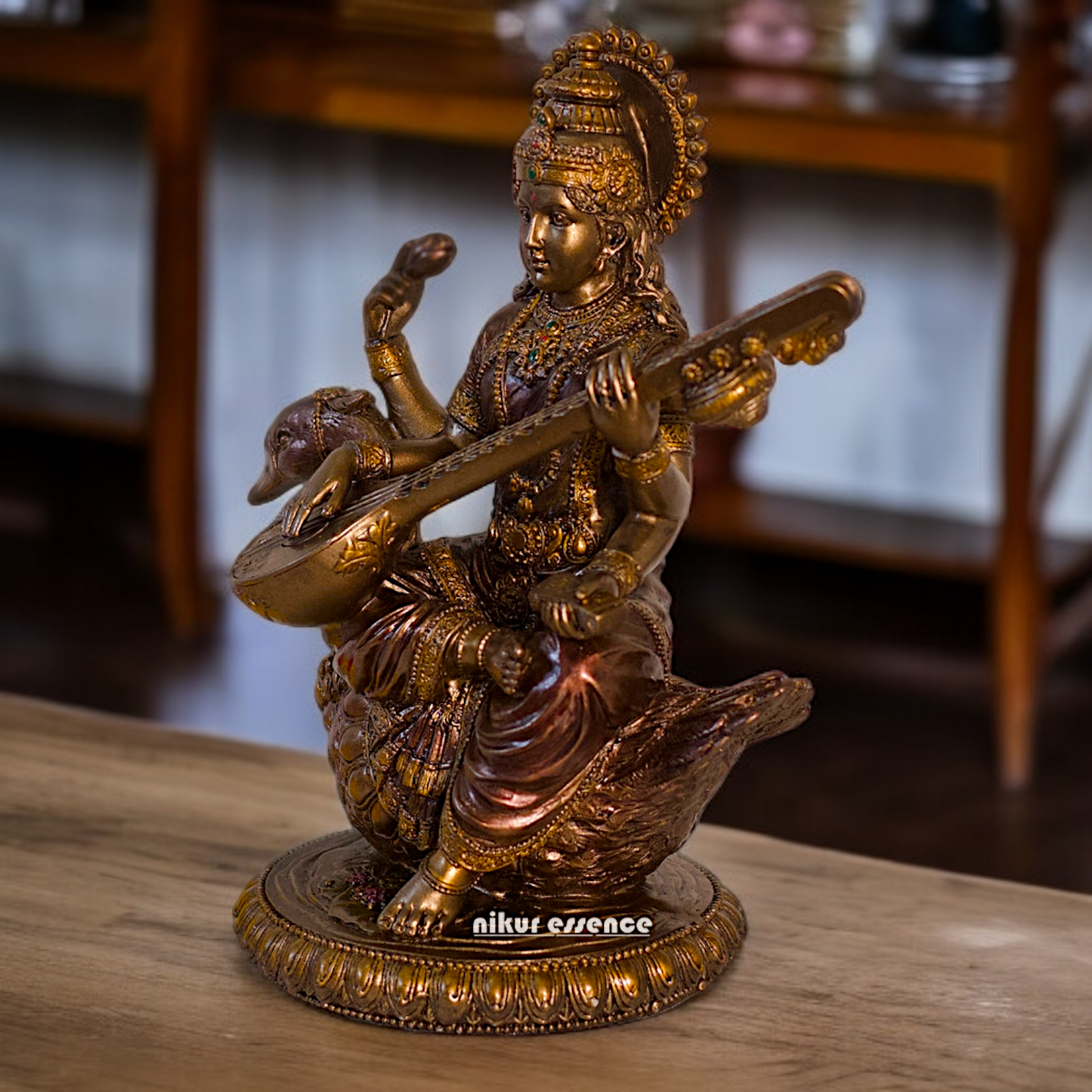 Large Saraswati seated on swan with Playing Veena Bronze Idol - 8.26 Inches Nikuressence