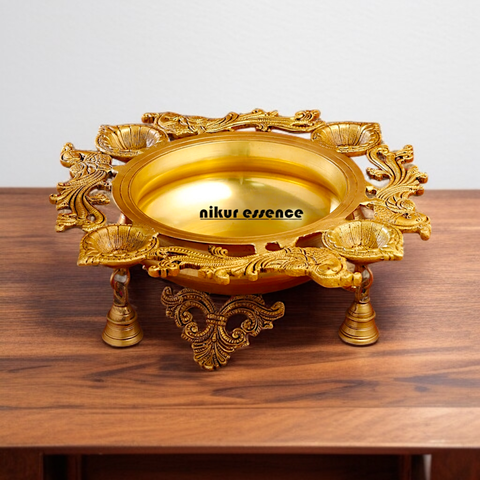 Brass Peacock Urli with 4 diya Nikuressence