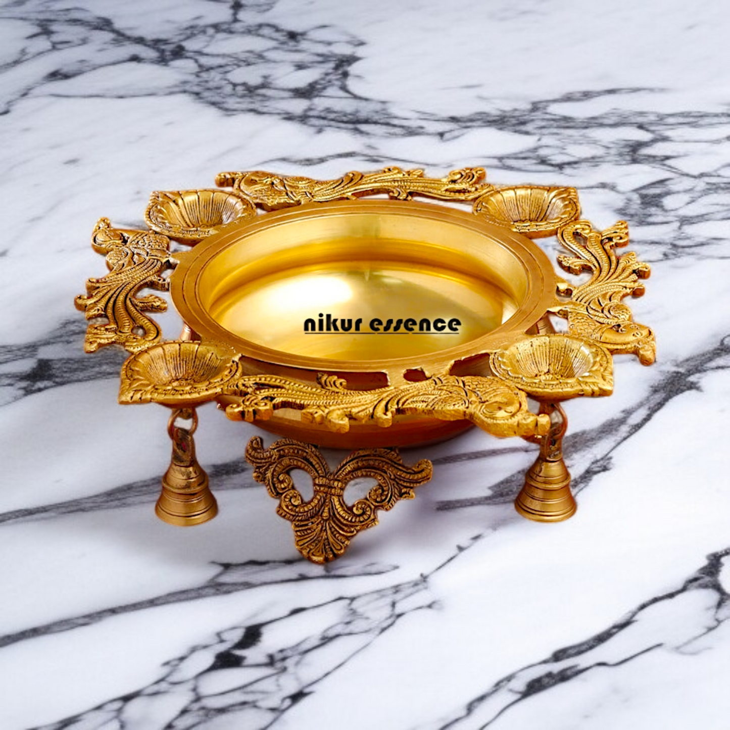 Brass Peacock Urli with 4 diya Nikuressence