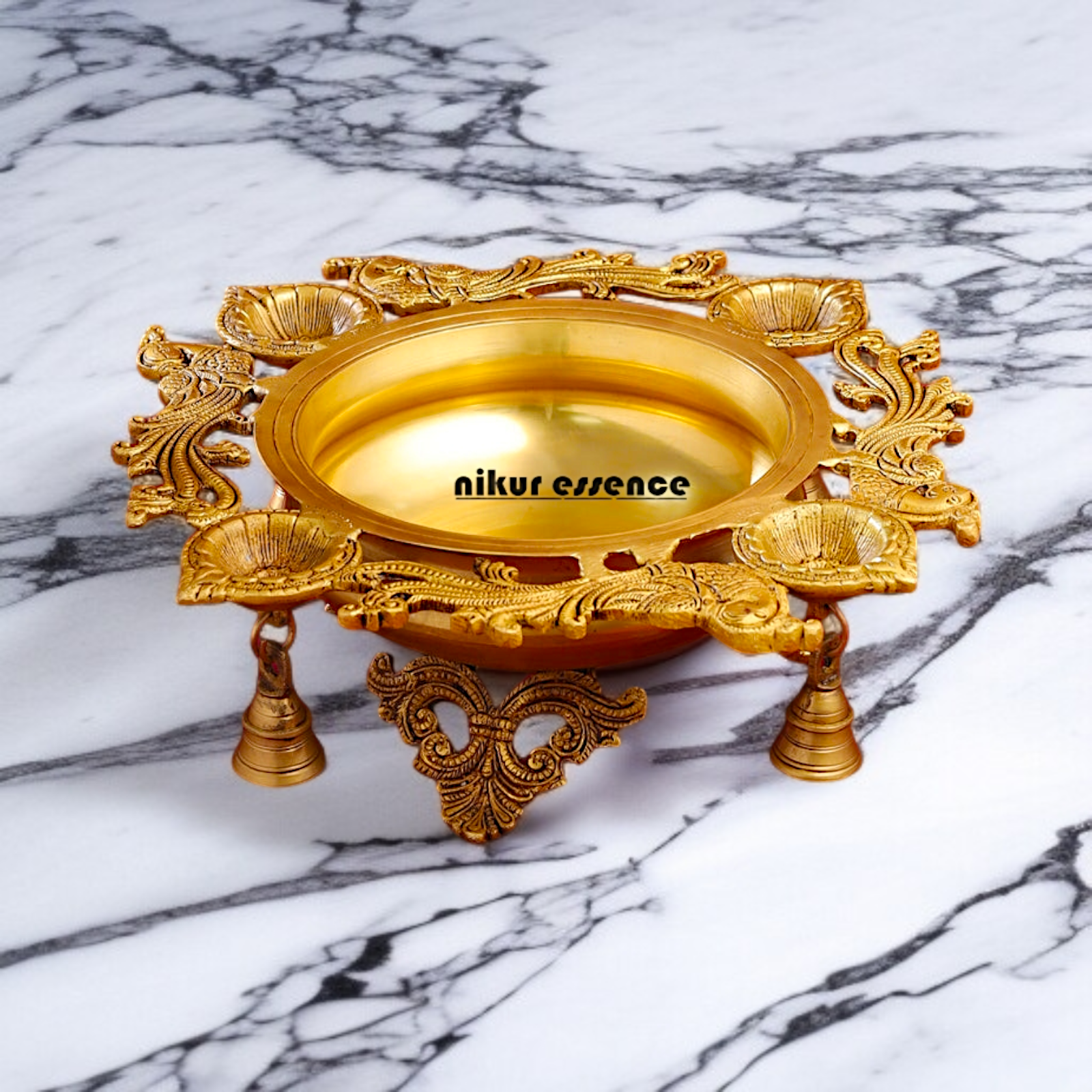 Brass Peacock Urli with 4 diya Nikuressence