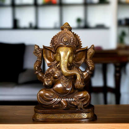 Ganesh Blessing seated with Four Armed Brass idol - 14 Inches Nikuressence