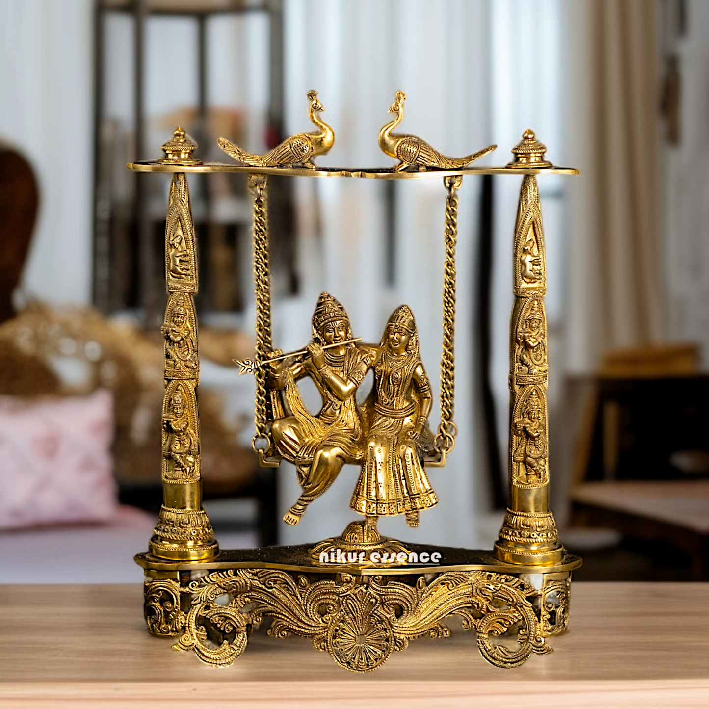 Radha Krishna seated on Jhula swing Solid Brass idol - 18 Inches Nikuressence
