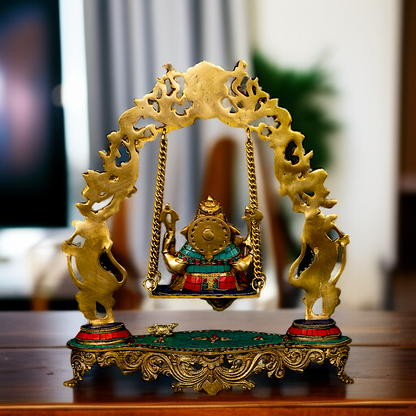 Ganesha Seated Jhula Swing Brass with stone work idol - 17 Inches Nikuressence