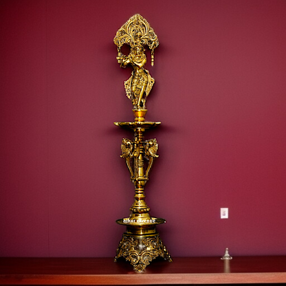 Solid Brass Krishna diya lamp stand with Bell - 27.5 Inches Nikuressence