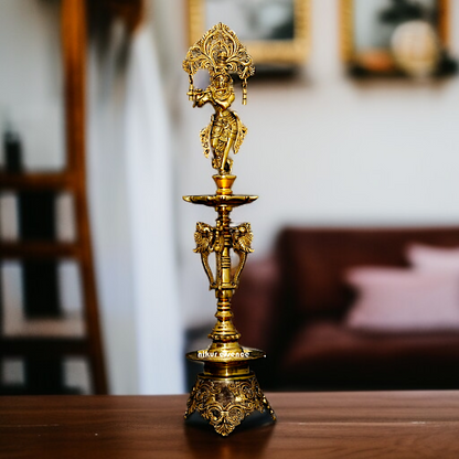 Solid Brass Krishna diya lamp stand with Bell - 27.5 Inches Nikuressence