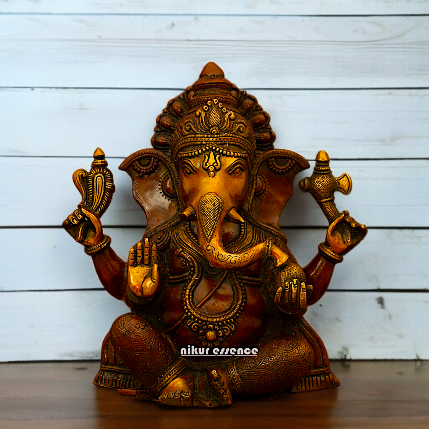 Ganesha with Laddoo seated Brass idol - 1 Feet Nikuressence