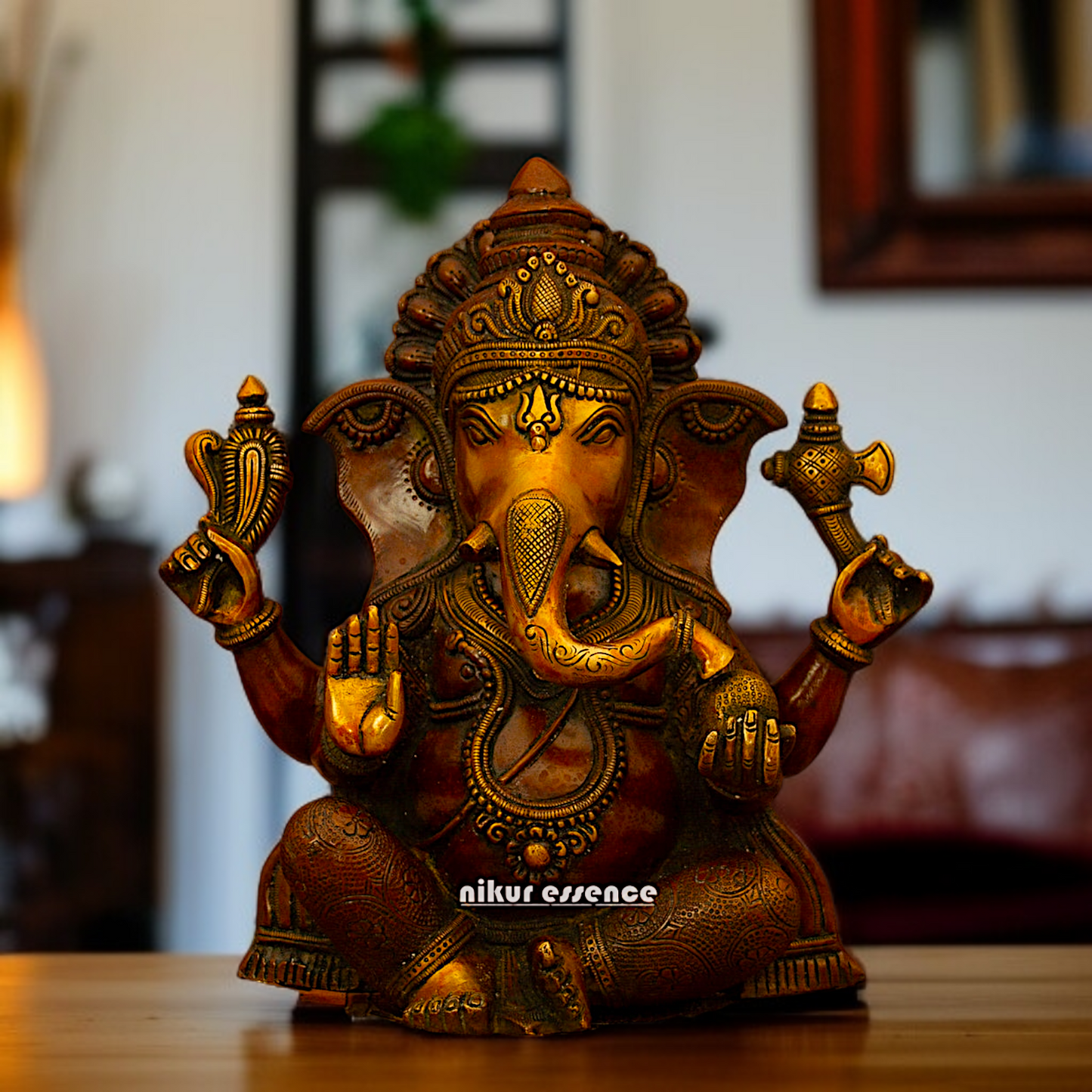 Ganesha with Laddoo seated Brass idol - 1 Feet Nikuressence