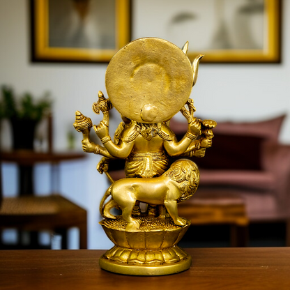 Drishti Ganesha Standing with Lion and hold trishul and Gada Brass idol - 10 Inches Nikuressence
