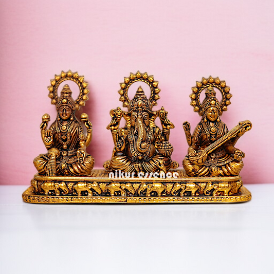 Ganesha Lakshmi Saraswati Seated Brass idol - 5.5 Inches Nikuressence