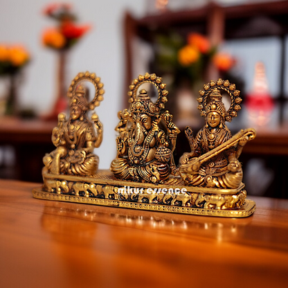 Ganesha Lakshmi Saraswati Seated Brass idol - 5.5 Inches Nikuressence