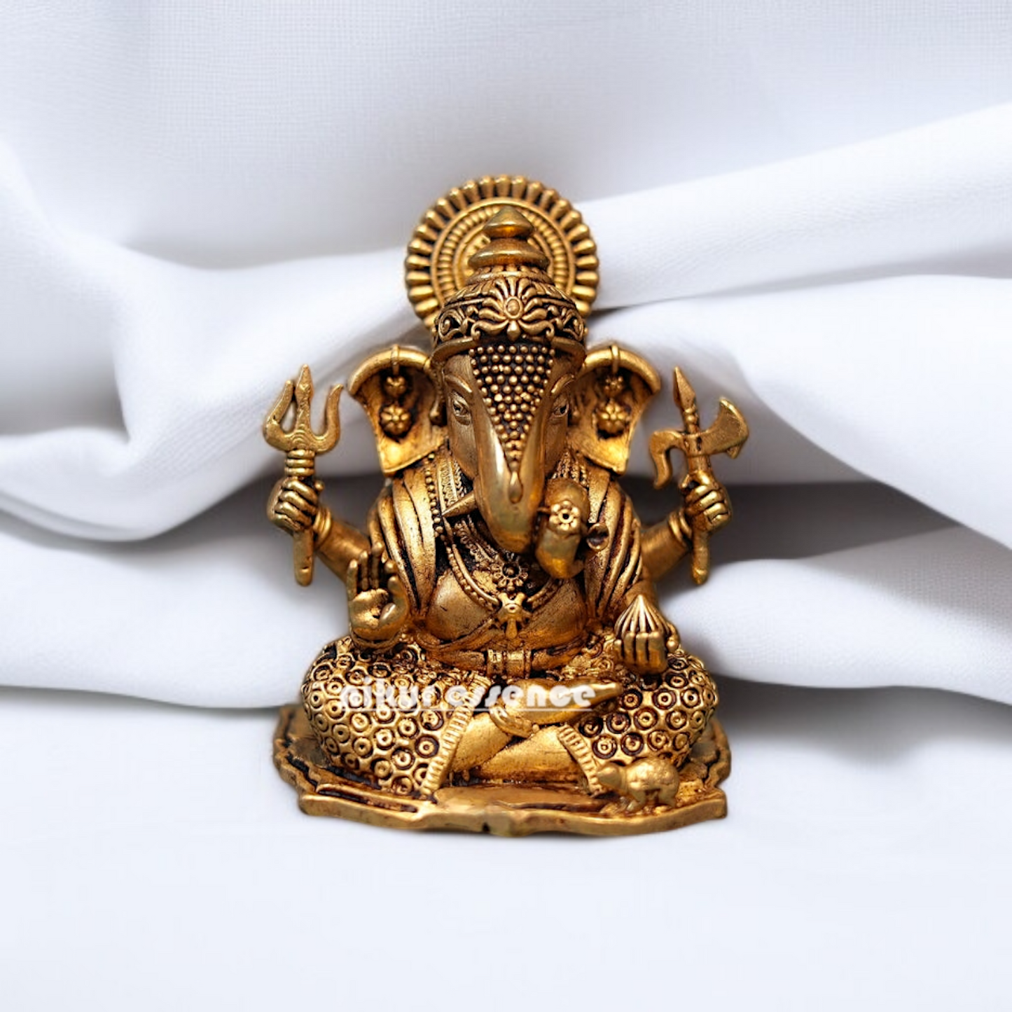 Lord Ganesha seated with Four hand superfine Brass idol - 4 Inches Nikuressence