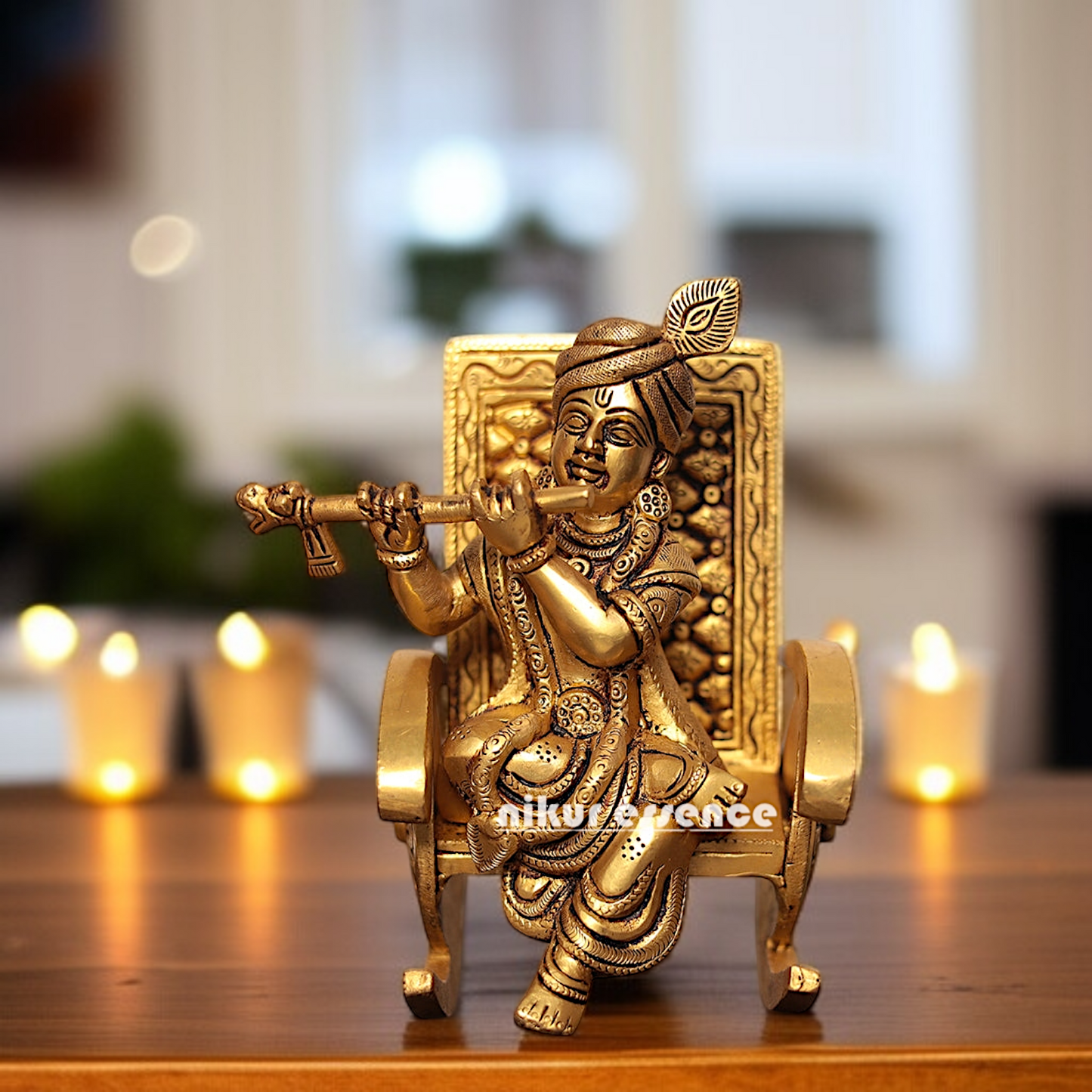 Pure Brass Krishna seated on swinging chair with Playing Flute idol - 6.5 Inches Nikuressence