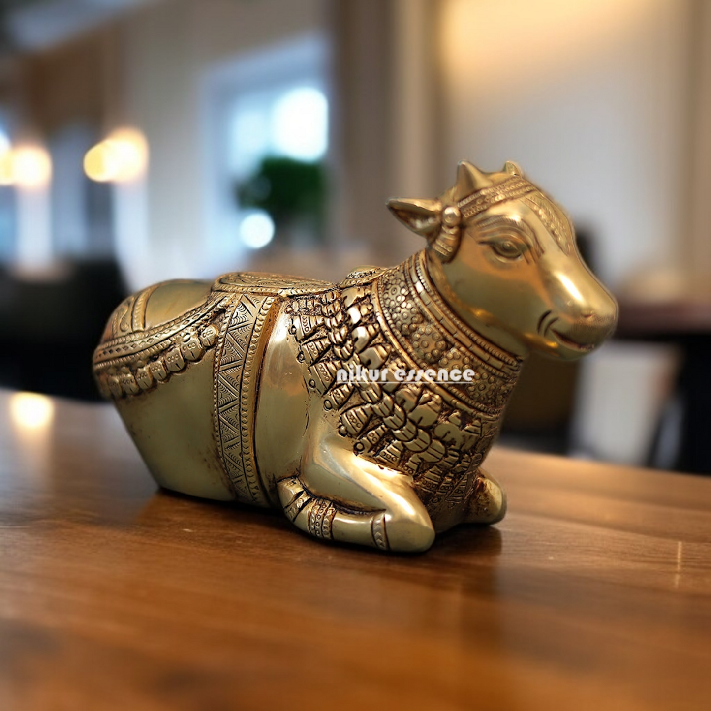 Nandi Sitting solid Brass idol - 9 Inches Nikuressence