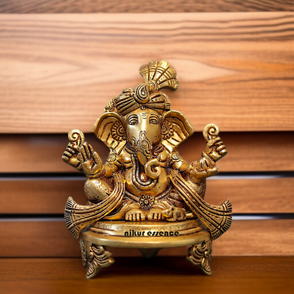 Ganesha pagdi Seated on chowki Brass idol - 7.5 Inches Nikuressence