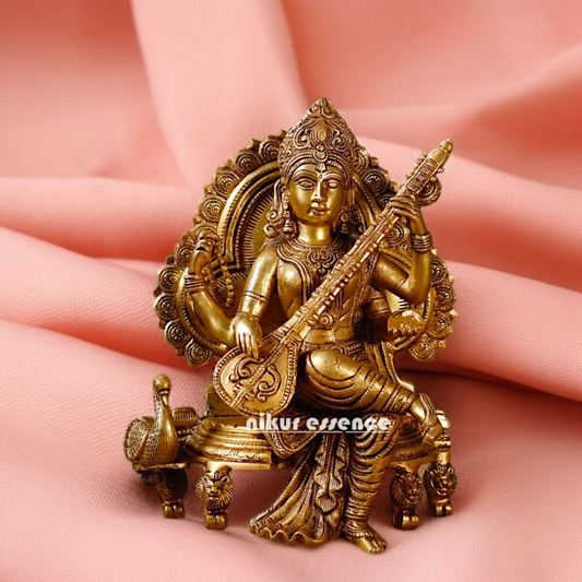 Goddess Saraswati Playing Veena Seated on singhasan Brass idol - 14 Inches Nikuressence