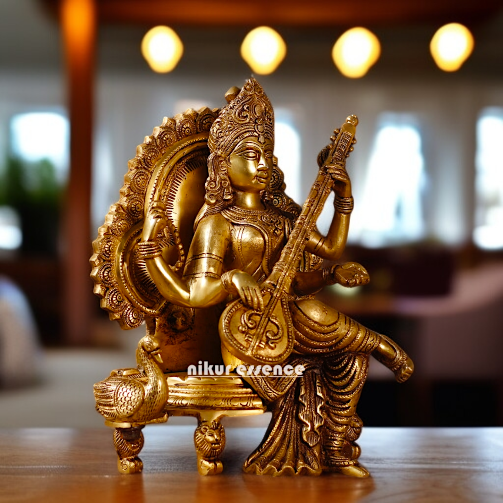 Goddess Saraswati Playing Veena Seated on singhasan Brass idol - 14 Inches Nikuressence