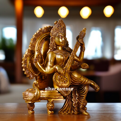 Goddess Saraswati Playing Veena Seated on singhasan Brass idol - 14 Inches Nikuressence