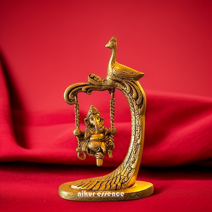 Pure Brass Ganesha Swing Jhula with peacock idol - 9.5 Inches Nikuressence