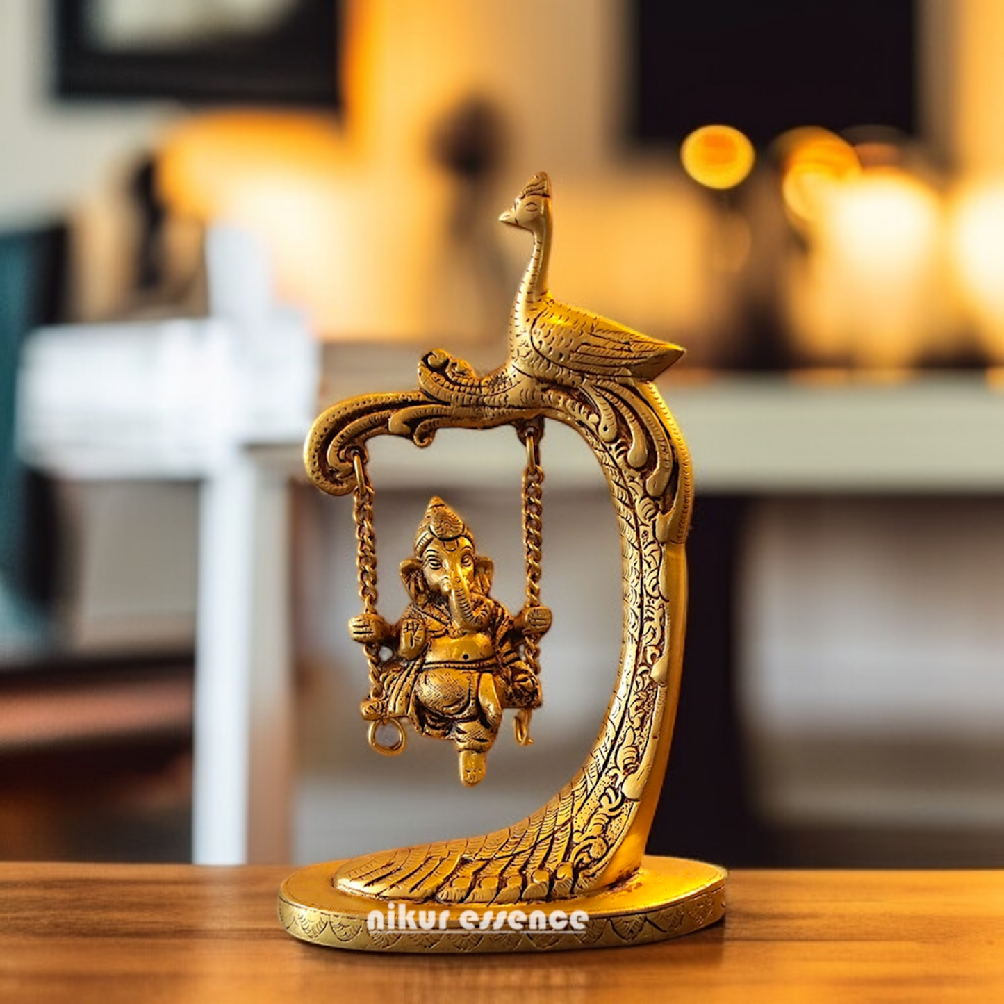 Pure Brass Ganesha Swing Jhula with peacock idol - 9.5 Inches Nikuressence