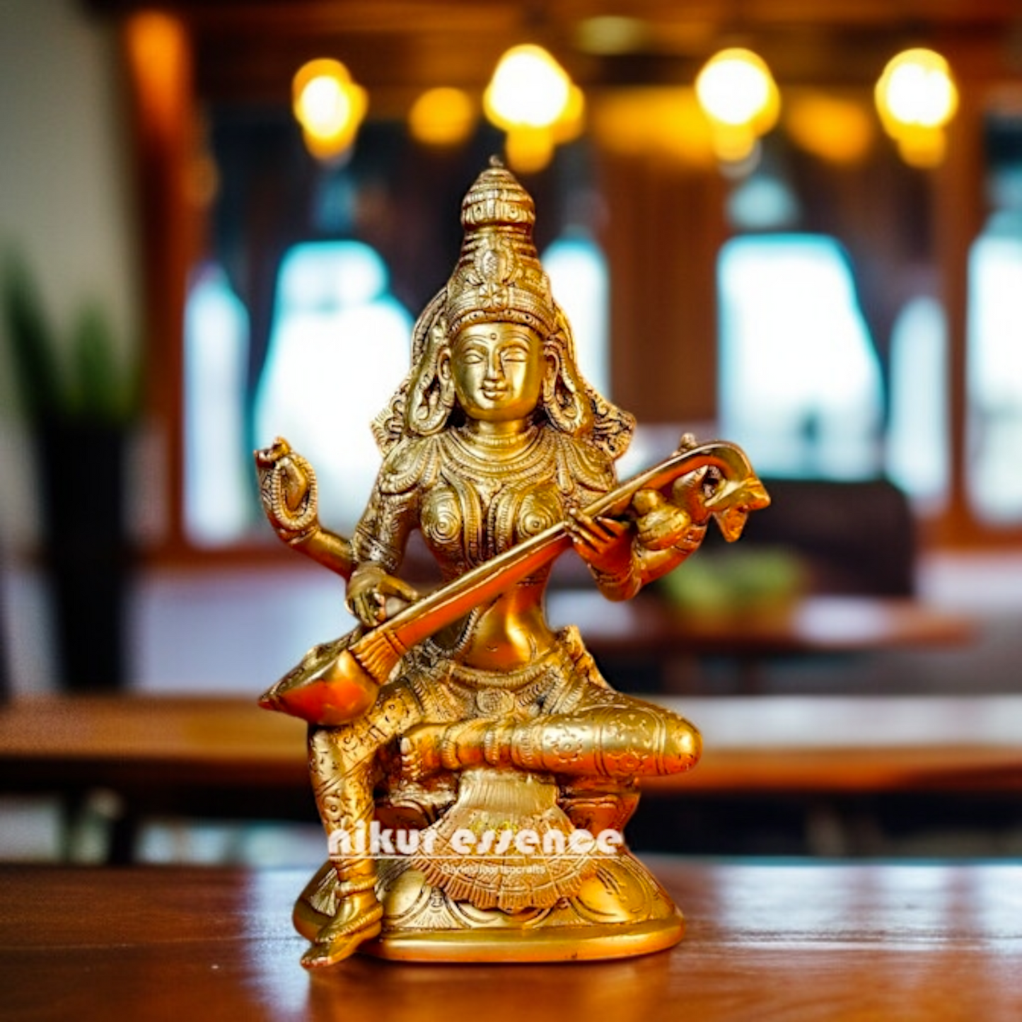 Pure Brass Saraswati Seated with Playing Veena statue - 8 Inches Nikuressence