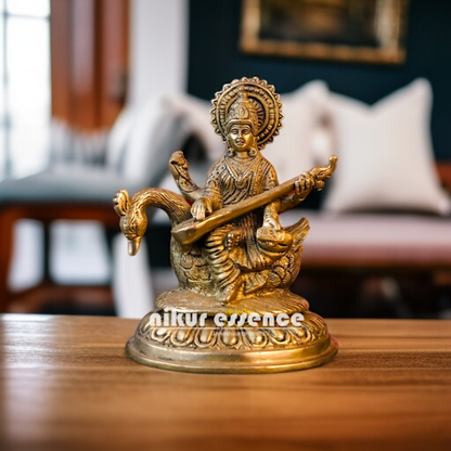Goddess Saraswati Maa Playing Veena Seated on swan Brass idol - 6.5 Inches Nikuressence