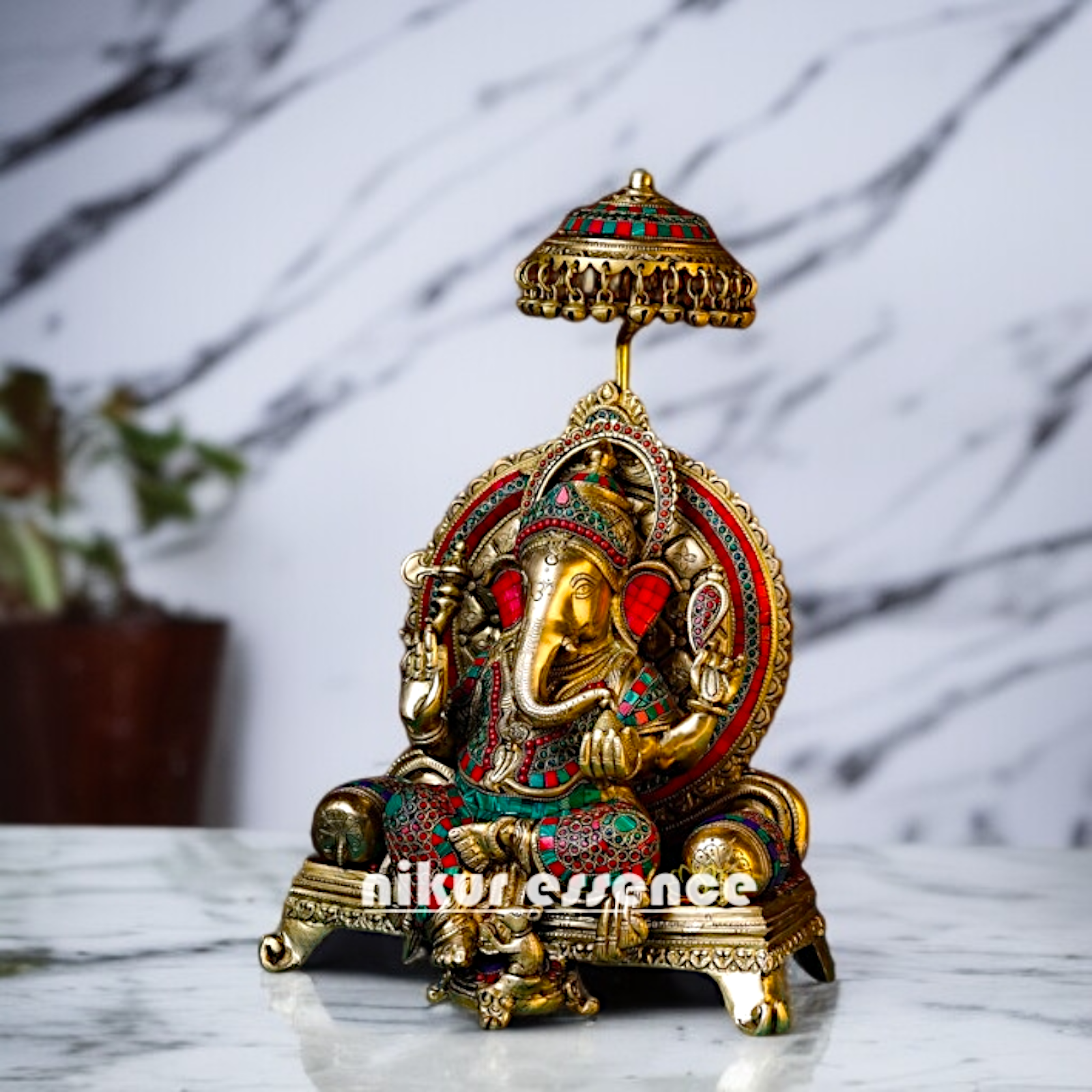 Ganesha Vinayaka Blessing seated on singhasan with umbrella and Bells Brass stone work idol - 19.291 inches Nikuressence
