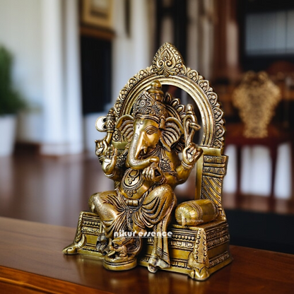 Ganesha Seated on singhasan Blessing Brass idol - 16.535 Inches Nikuressence