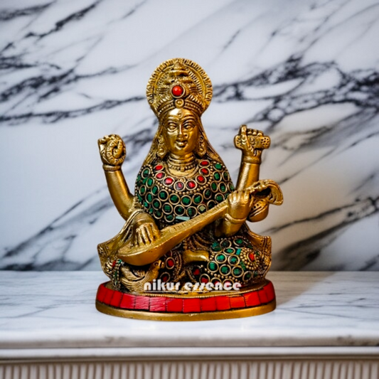 Saraswati Maa Playing Veena Seated Brass with stone work idol - 6 Inches Nikuressence