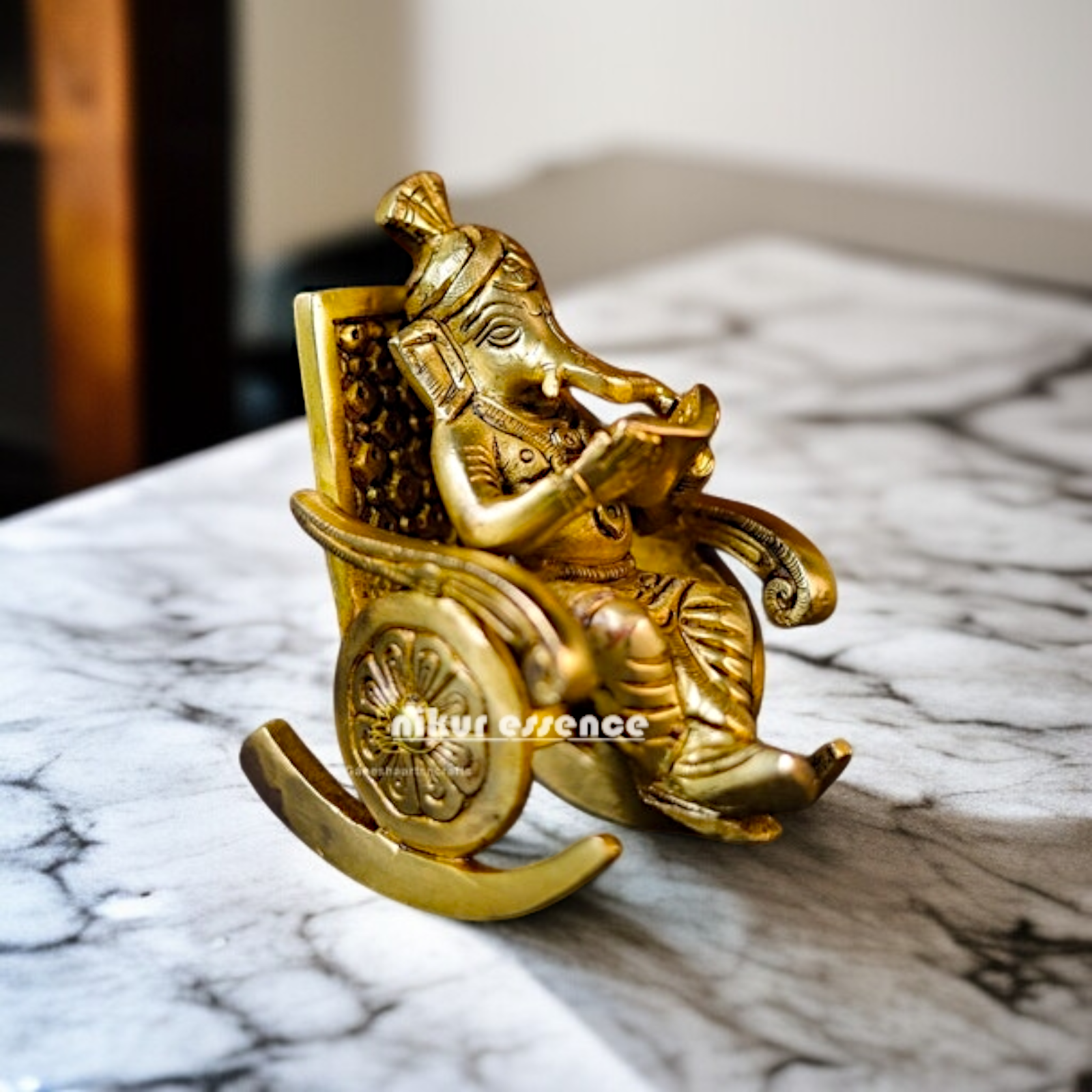 Pure Brass Ganesha Ganpati Read Book Seated on swing chair idol - 5 Inches Nikuressence