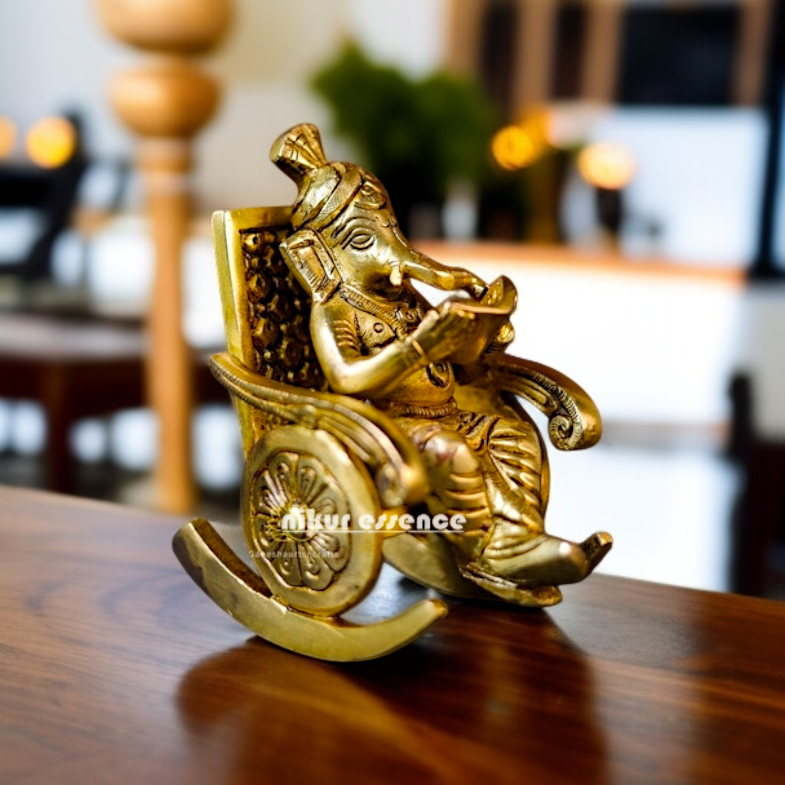 Pure Brass Ganesha Ganpati Read Book Seated on swing chair idol - 5 Inches Nikuressence