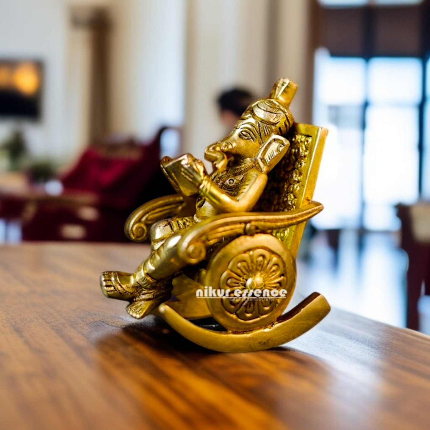 Pure Brass Ganesha Ganpati Read Book Seated on swing chair idol - 5 Inches Nikuressence