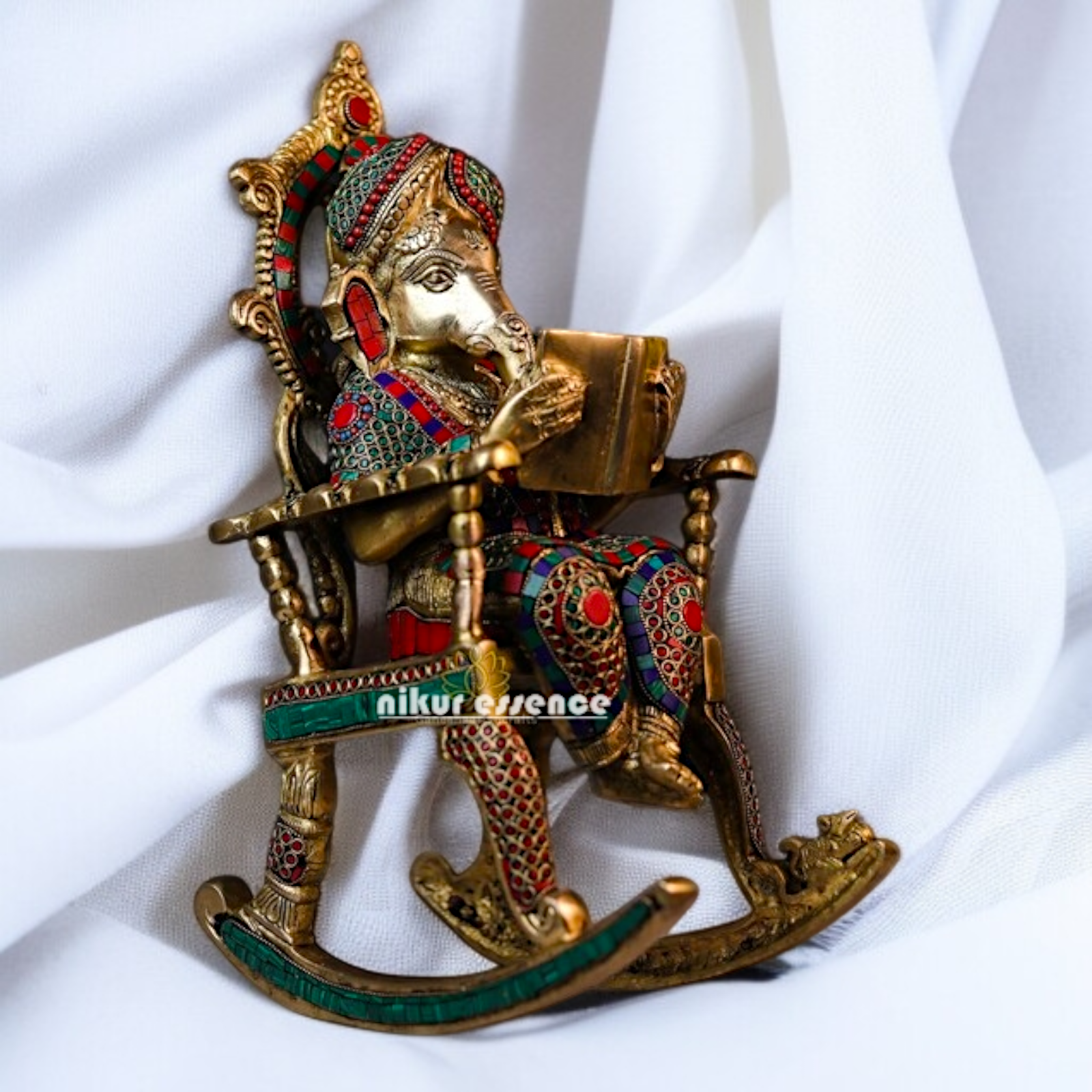 Lord Ganesha seated on swing chair with read book Brass stone work idol - 17 Inches Nikuressence