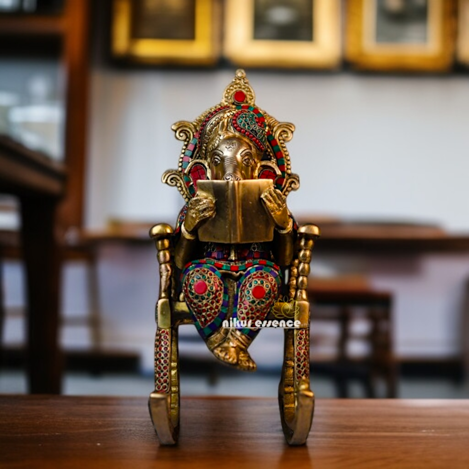 Lord Ganesha seated on swing chair with read book Brass stone work idol - 17 Inches Nikuressence