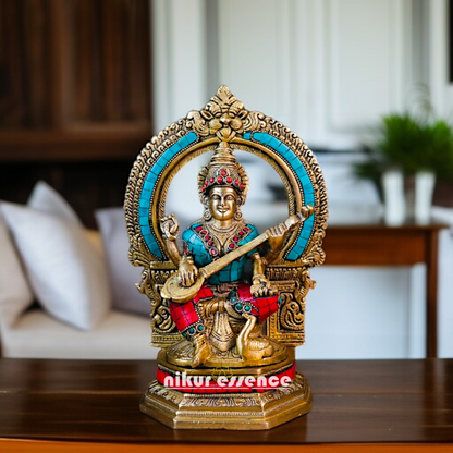 Goddess Saraswati Maa Seated with Playing Veena Brass stone work idol - 10 Inches Nikuressence