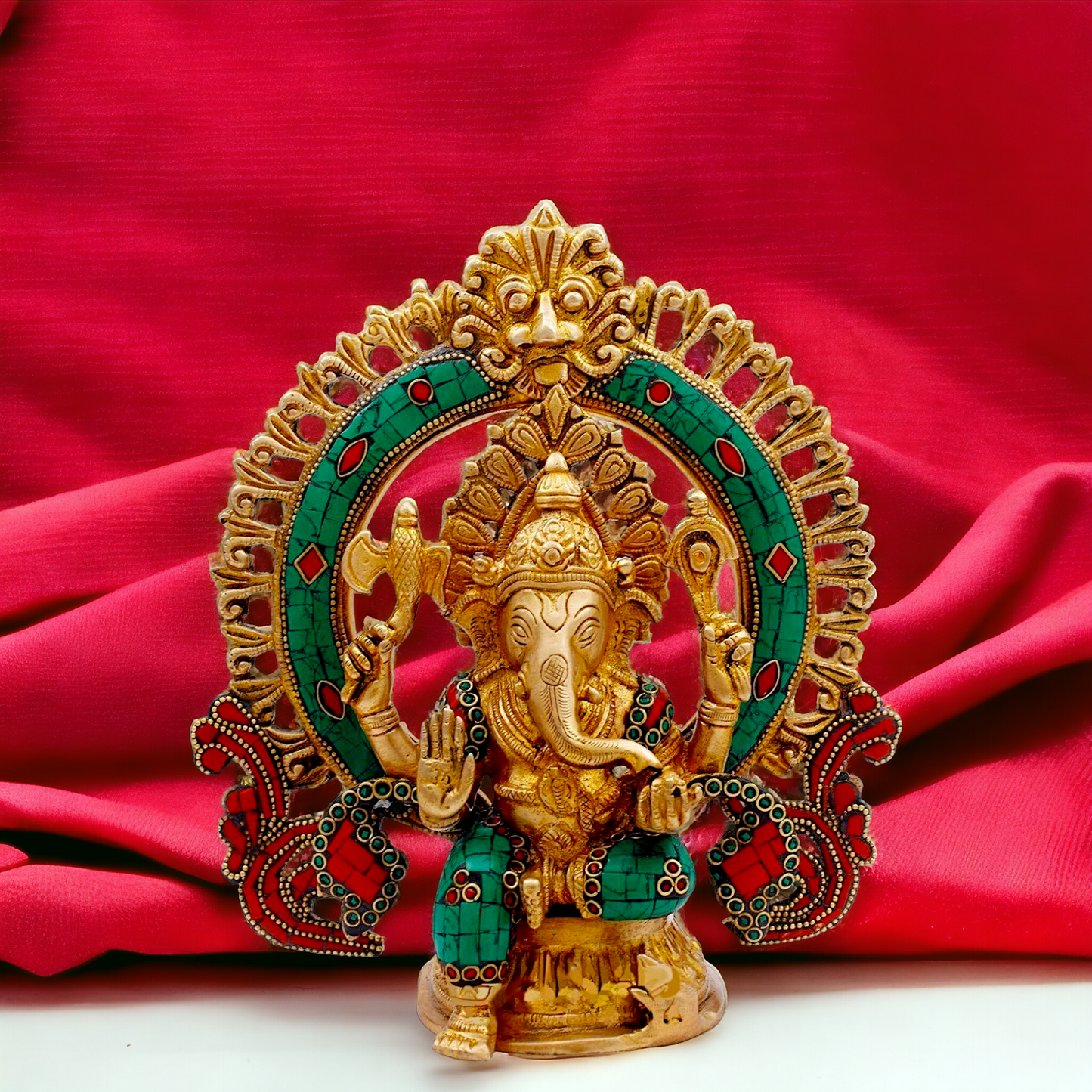 Buy Ganesha Sitting Brass with Stone Work statue - 9 nches Nikuressence