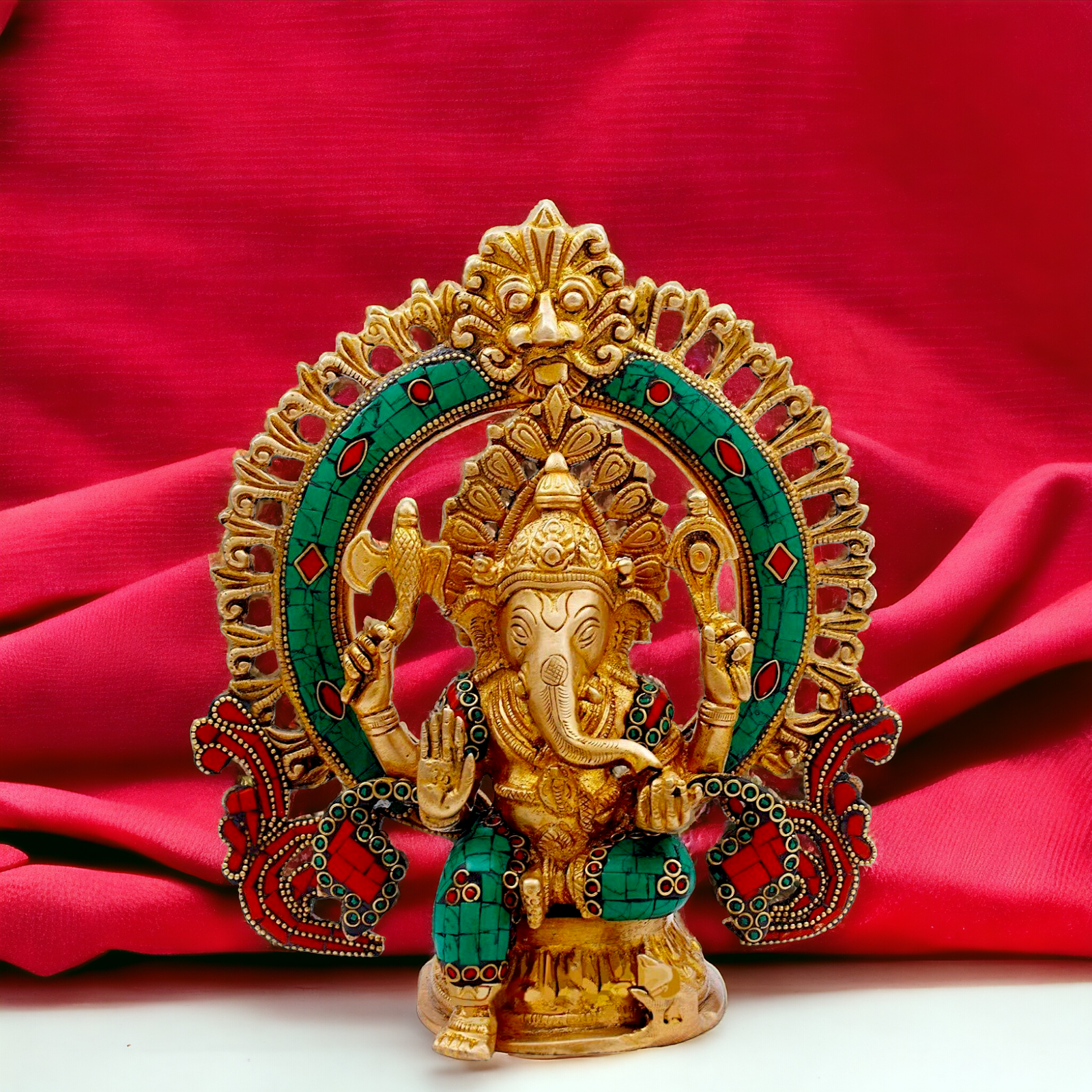 Buy Ganesha Sitting Brass with Stone Work statue - 9 nches Nikuressence